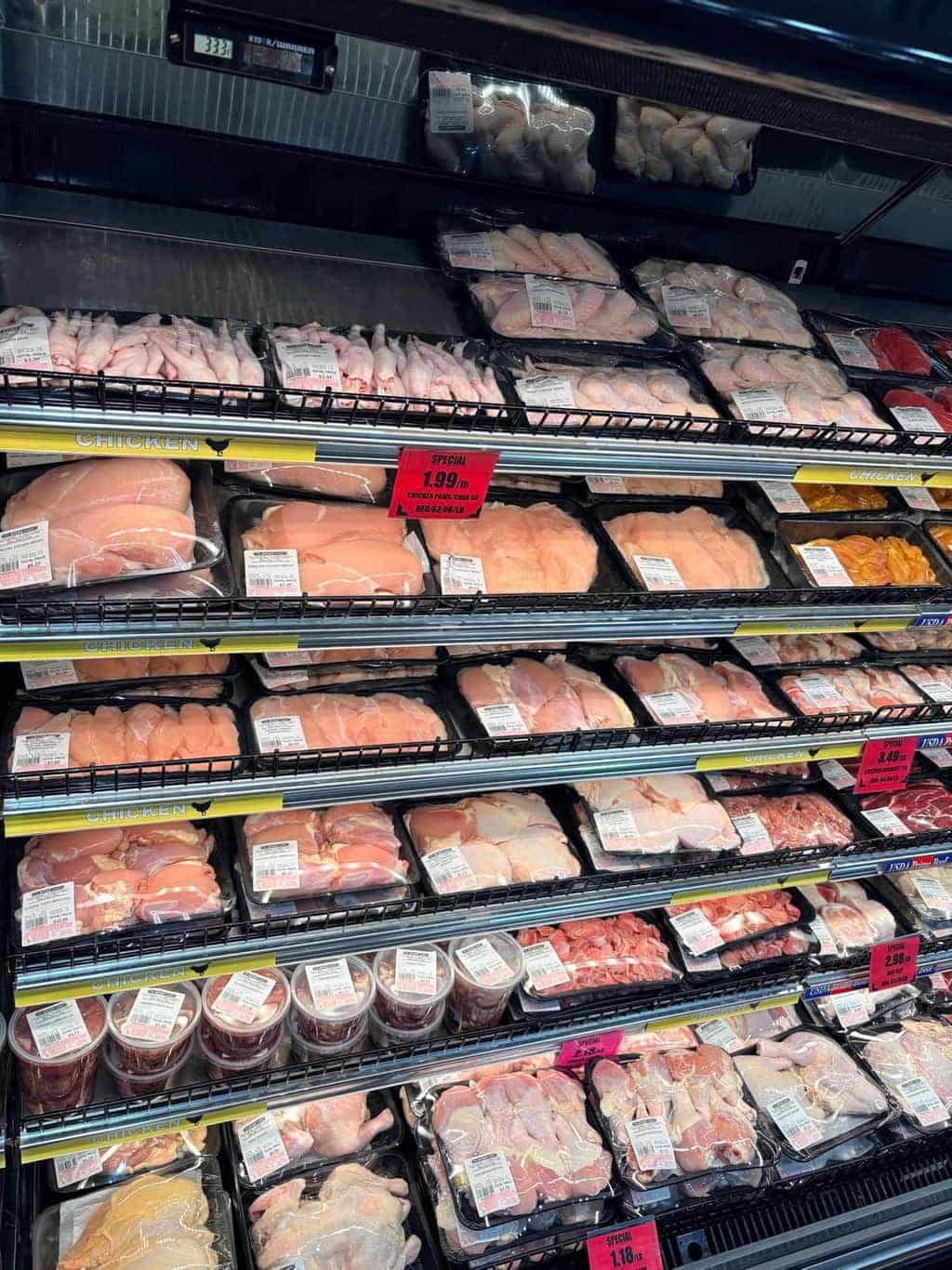 Refrigerated chicken selection at Asian Market Escondido