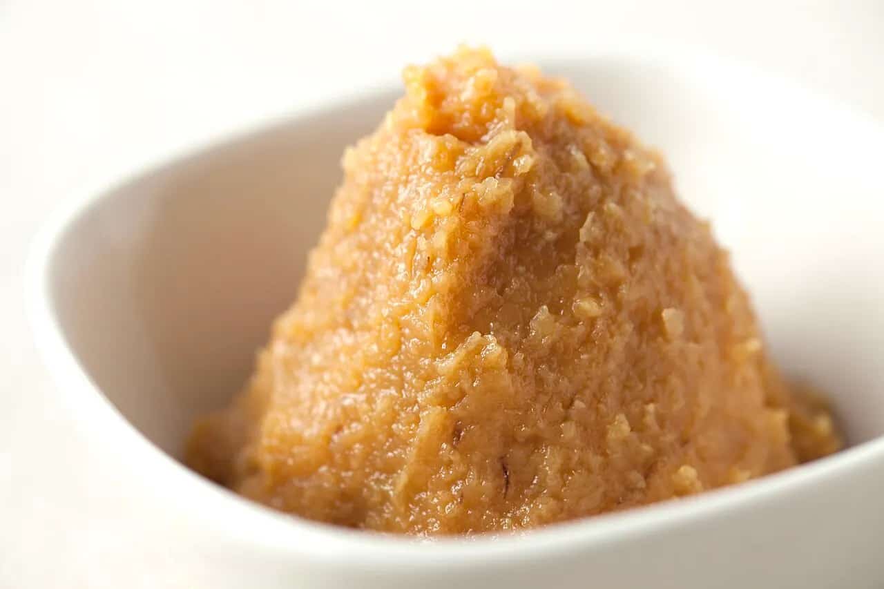 Light Japanese miso paste in a small serving bowl