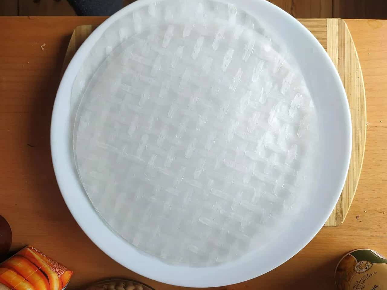 Round dry rice paper wrapper showing its woven texture